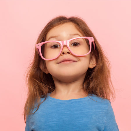 Kijken door een roze kinderbril